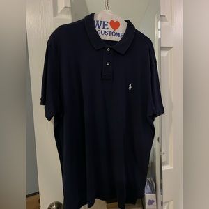 Selling a short sleeve polo shirt by Ralph Lauren. Black excellent condition.